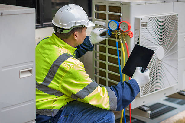Professional Hvac technician working in Clinton, MS